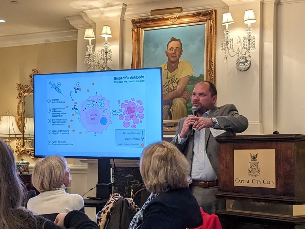 Dr. Eric Dejesus gives a presentation to the Atlanta Area ARCS society.